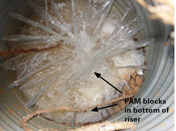 Photo showing PAM blocks in bottom of riser.